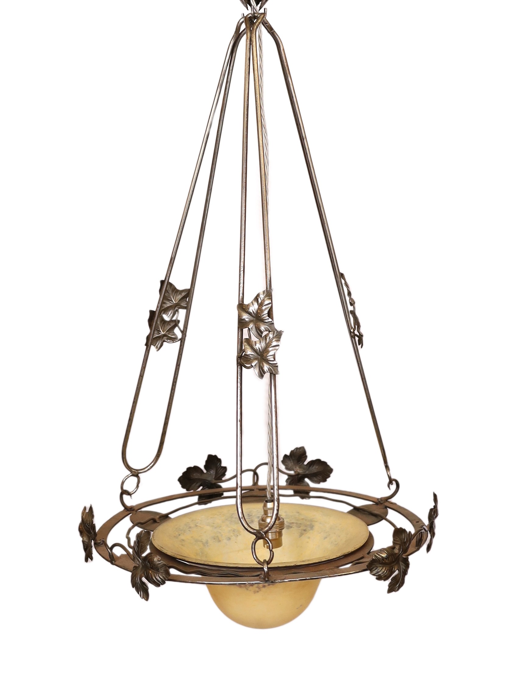 A 1920's-30's French polished wrought iron and marbled glass light fitting decorated with foliate motifs, drop 90cm, width 40cm